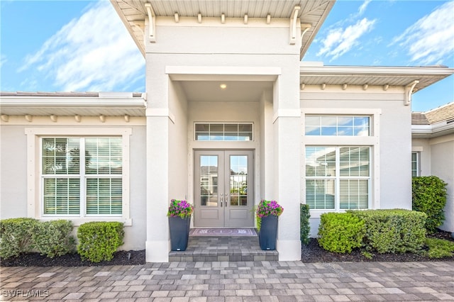 doorway to property featuring french doors