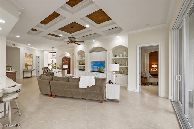 tiled living room featuring ornamental molding, coffered ceiling, built in shelves, ceiling fan, and beamed ceiling