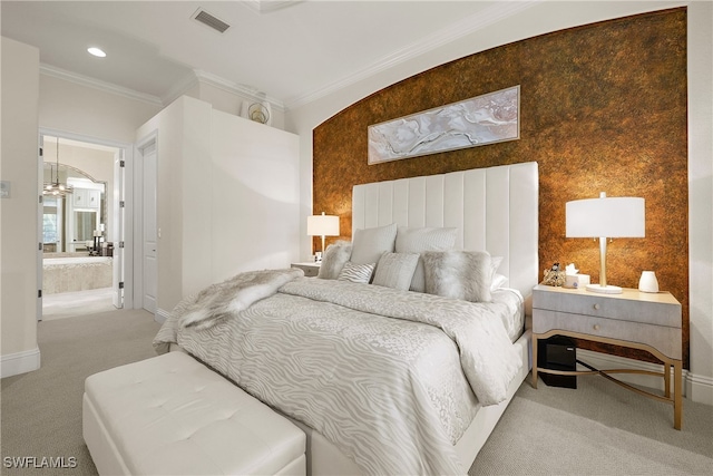 bedroom featuring carpet flooring, a notable chandelier, ensuite bathroom, and crown molding