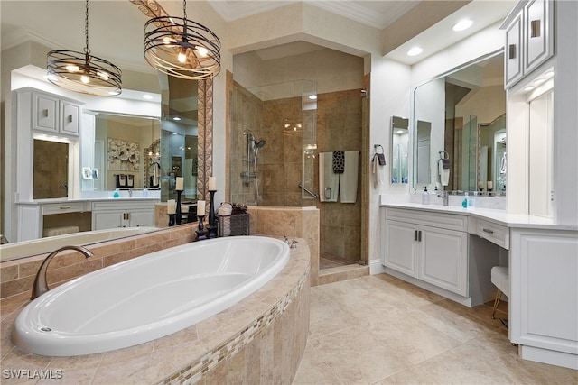 bathroom with vanity, an inviting chandelier, tile patterned floors, ornamental molding, and independent shower and bath