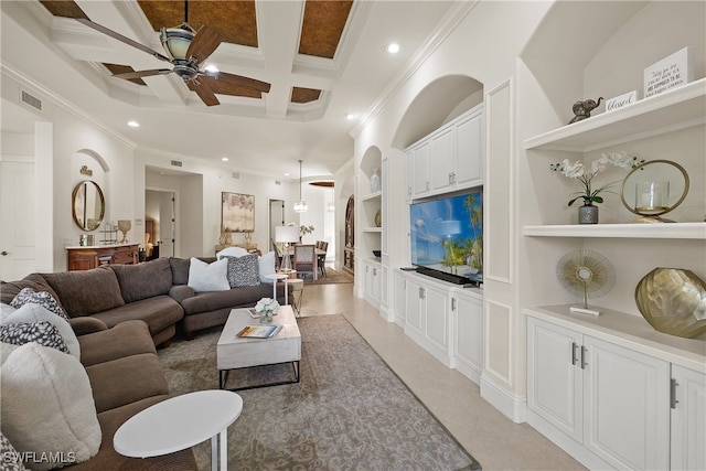 living room with ceiling fan, beam ceiling, ornamental molding, and coffered ceiling