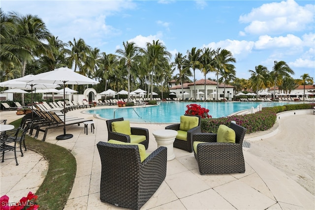 view of swimming pool featuring a patio area