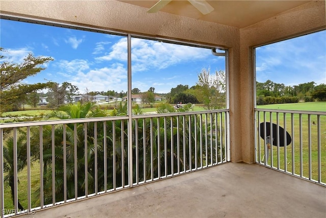 balcony featuring ceiling fan