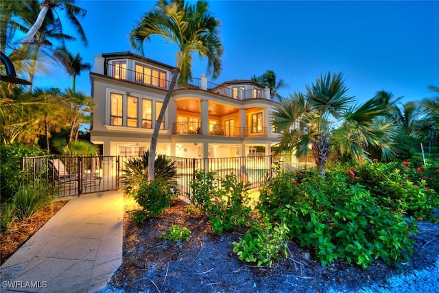 view of front of home with a balcony