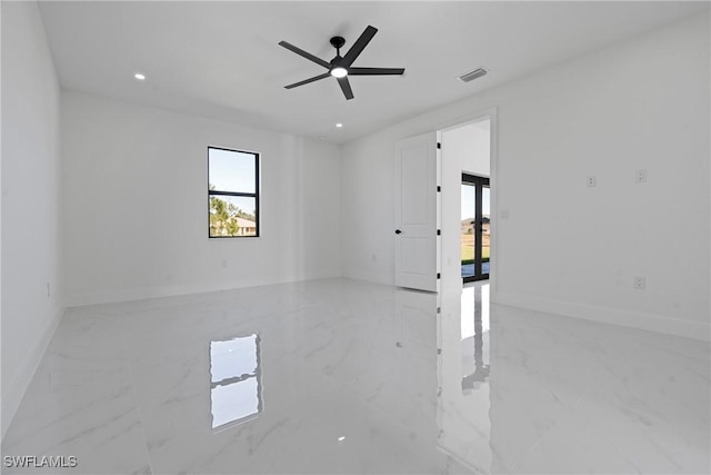 empty room featuring ceiling fan