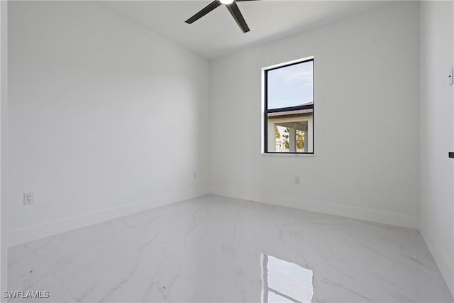 empty room featuring ceiling fan