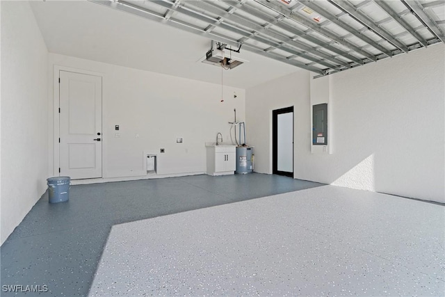 garage with electric panel, water heater, and a garage door opener