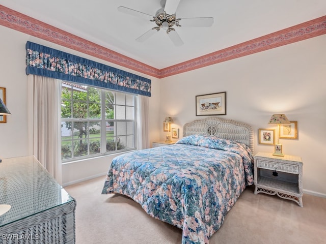 bedroom featuring ceiling fan and carpet floors