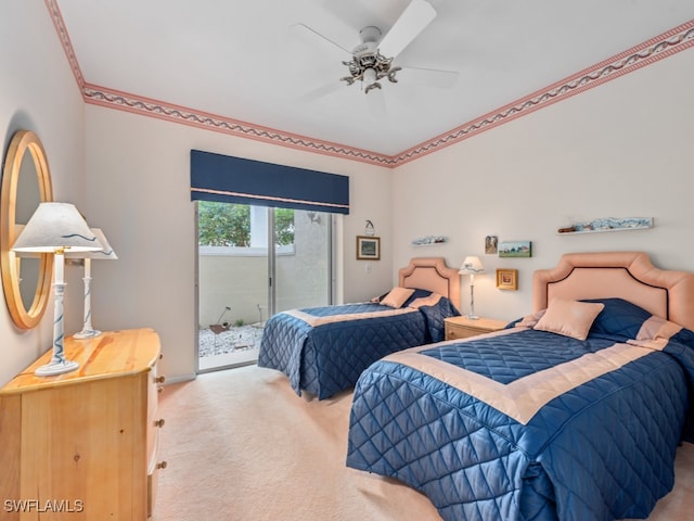 carpeted bedroom with ceiling fan, ornamental molding, and access to outside