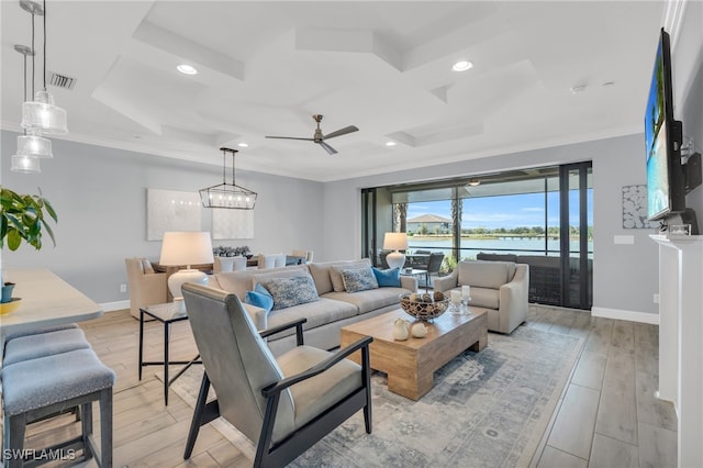 living room featuring crown molding, light hardwood / wood-style flooring, and ceiling fan with notable chandelier