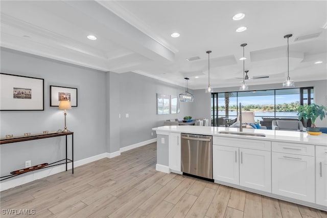 kitchen featuring sink, light hardwood / wood-style flooring, stainless steel dishwasher, decorative light fixtures, and white cabinetry