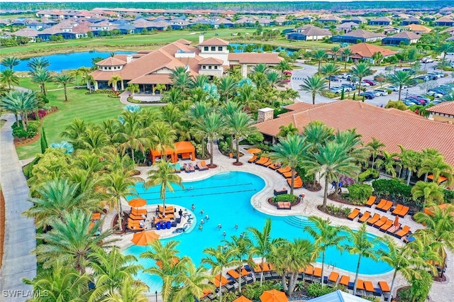 view of pool with a water view