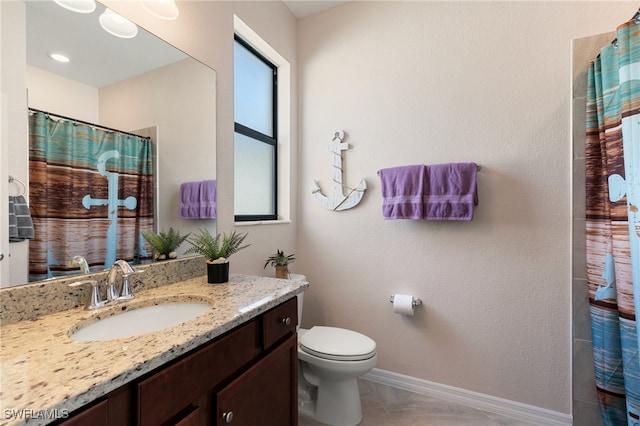 bathroom with walk in shower, tile patterned floors, vanity, and toilet