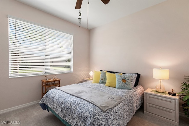 bedroom with light colored carpet and ceiling fan