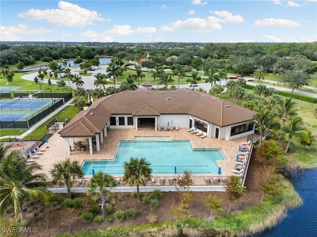 view of pool with a water view