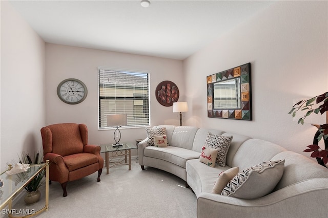 living room featuring carpet floors and a healthy amount of sunlight