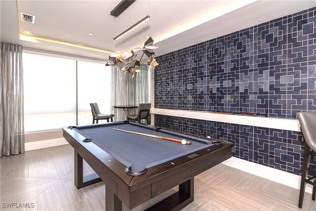 recreation room featuring tile walls and billiards