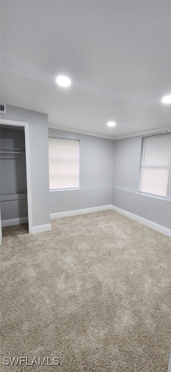 spare room with carpet flooring