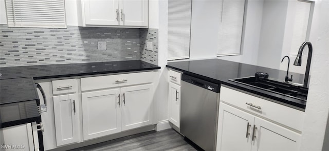 kitchen featuring white cabinetry, backsplash, dark hardwood / wood-style flooring, dishwasher, and sink