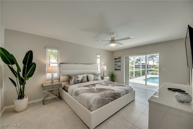 tiled bedroom featuring ceiling fan, access to exterior, and multiple windows