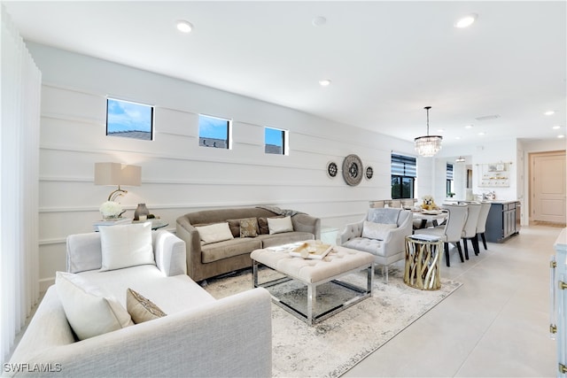 living room with an inviting chandelier