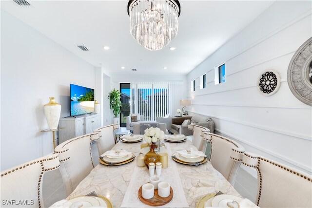 dining room featuring an inviting chandelier