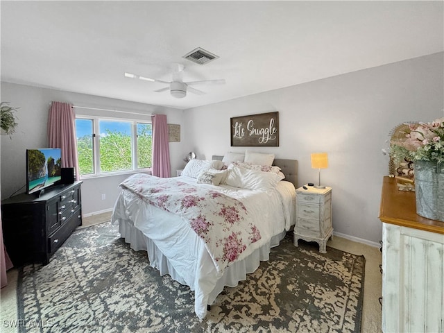 carpeted bedroom featuring ceiling fan