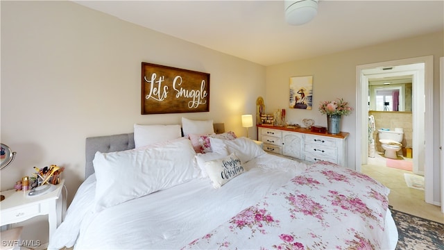 bedroom featuring ensuite bath