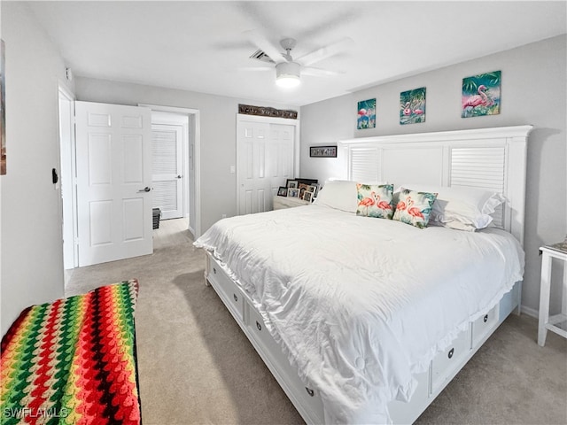 bedroom featuring light carpet, a closet, and ceiling fan