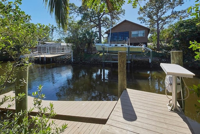 view of dock with a water view