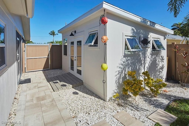 view of side of property with an outdoor structure