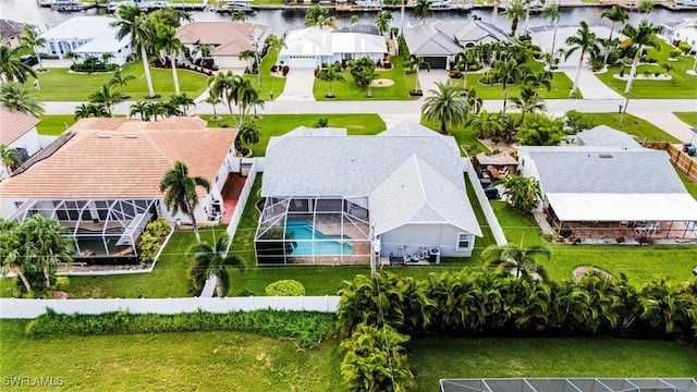 drone / aerial view with a water view