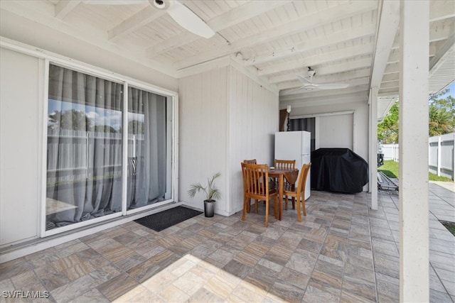 view of patio featuring ceiling fan and grilling area