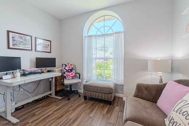 office area featuring dark wood-style floors and baseboards