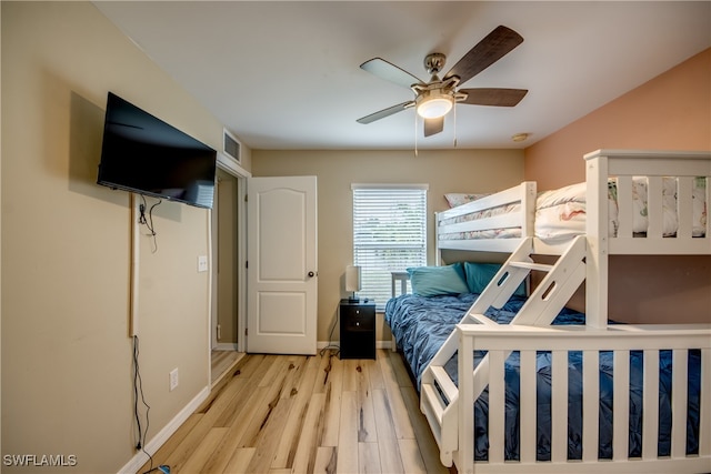 bedroom featuring ceiling fan and light hardwood / wood-style floors