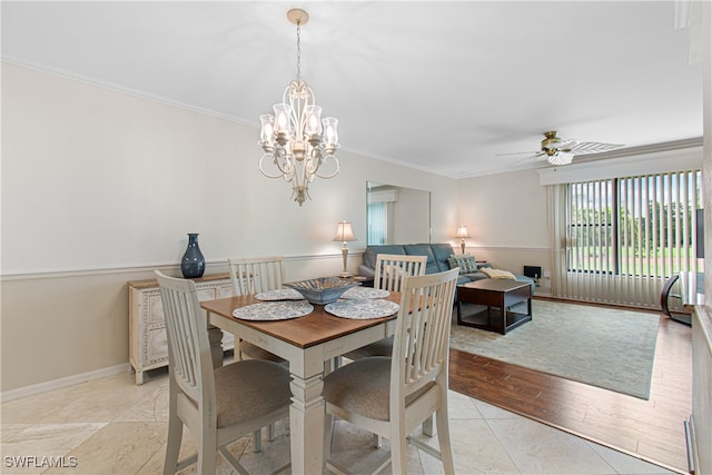 dining area featuring crown molding, ceiling fan with notable chandelier, and light wood-type flooring