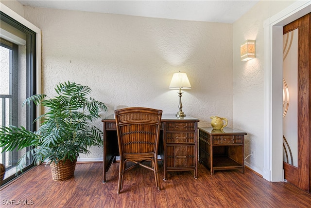 sitting room featuring dark hardwood / wood-style flooring