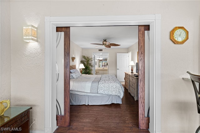 bedroom with ceiling fan and dark hardwood / wood-style flooring