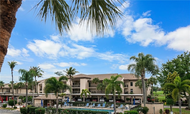 view of property with a pool