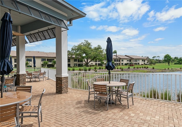 view of patio / terrace featuring a water view