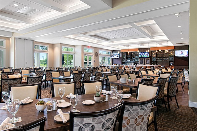 dining space with a tray ceiling