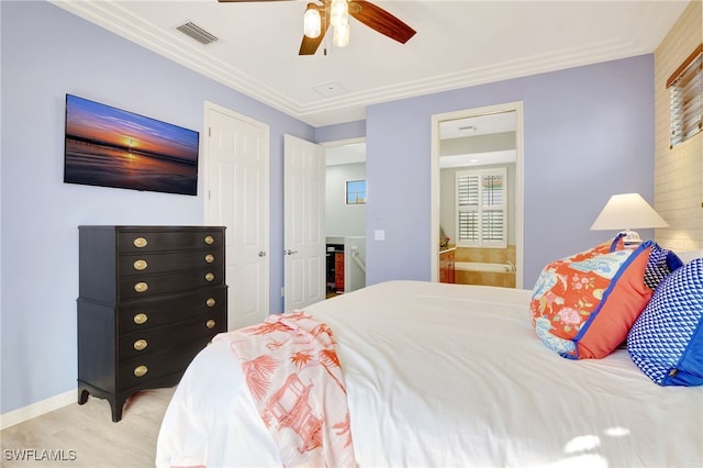 bedroom with ceiling fan, crown molding, connected bathroom, and light hardwood / wood-style flooring