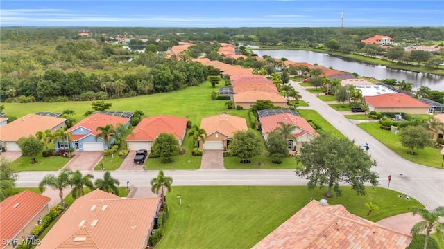 drone / aerial view featuring a water view