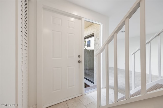 view of tiled foyer entrance