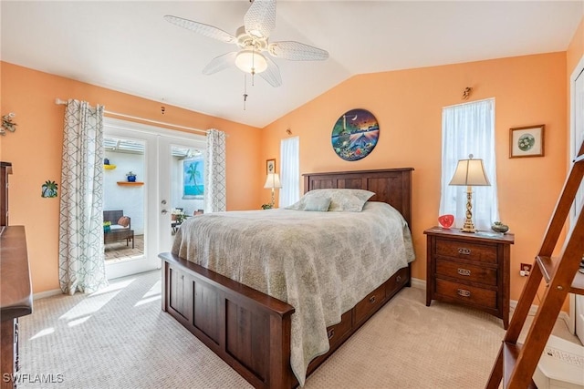 carpeted bedroom with ceiling fan, lofted ceiling, french doors, and access to outside