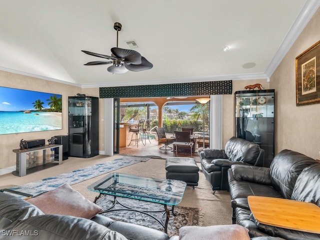 living room featuring crown molding, ceiling fan, and vaulted ceiling