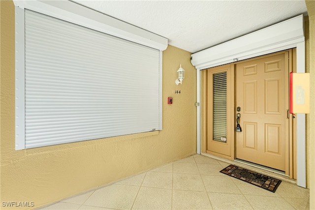 doorway to property featuring a porch