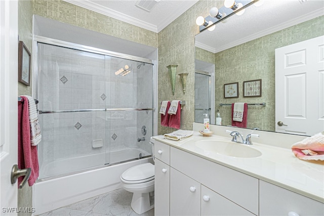 full bathroom featuring vanity, bath / shower combo with glass door, toilet, ornamental molding, and a textured ceiling