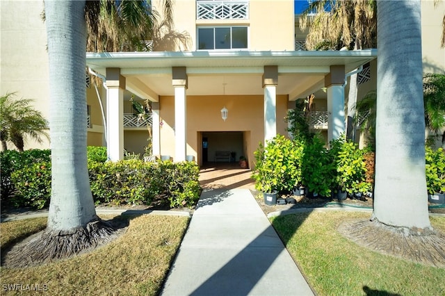 doorway to property featuring a fireplace