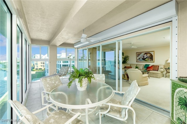 sunroom / solarium with ceiling fan